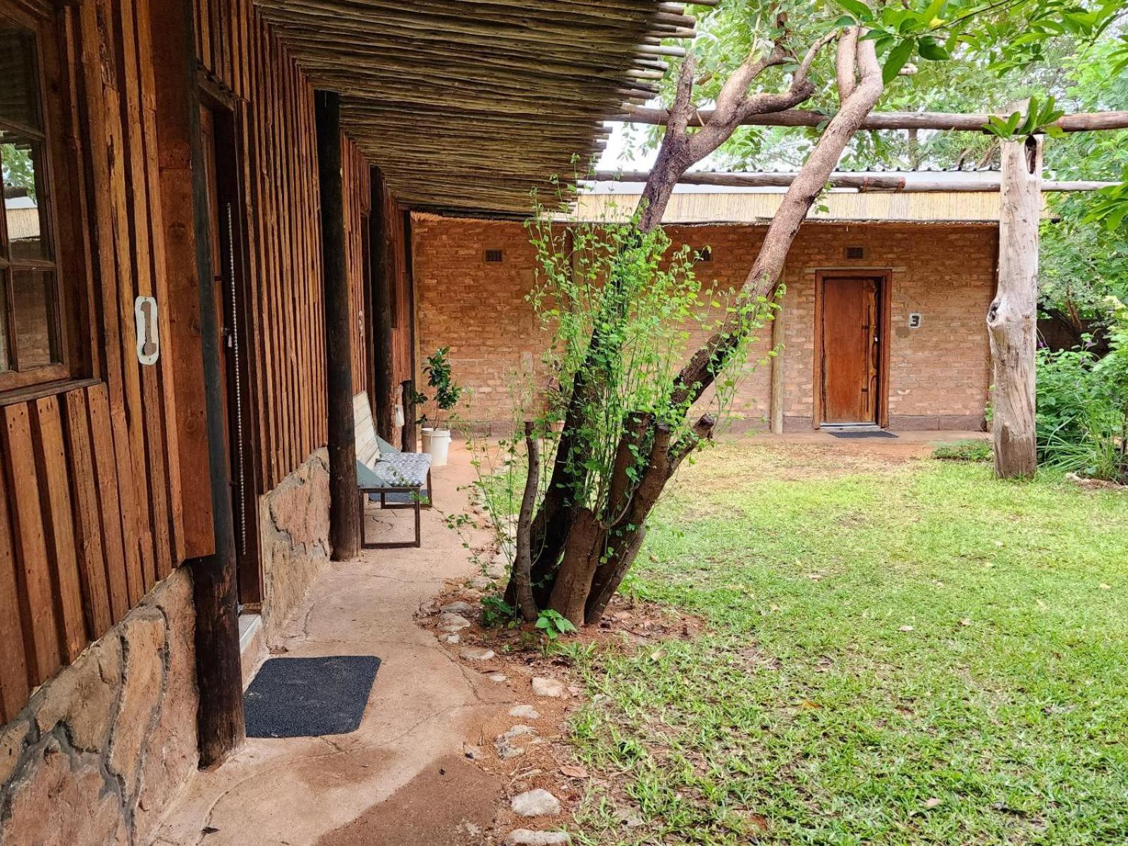 Nxabii Cottages Касане Номер фото
